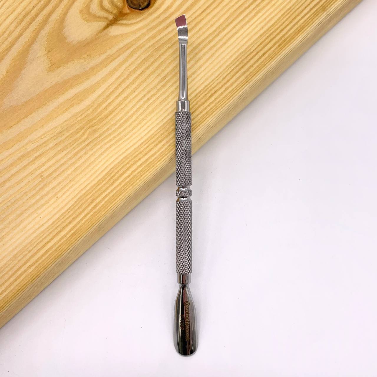Manicure pusher with prof. manual sharpening